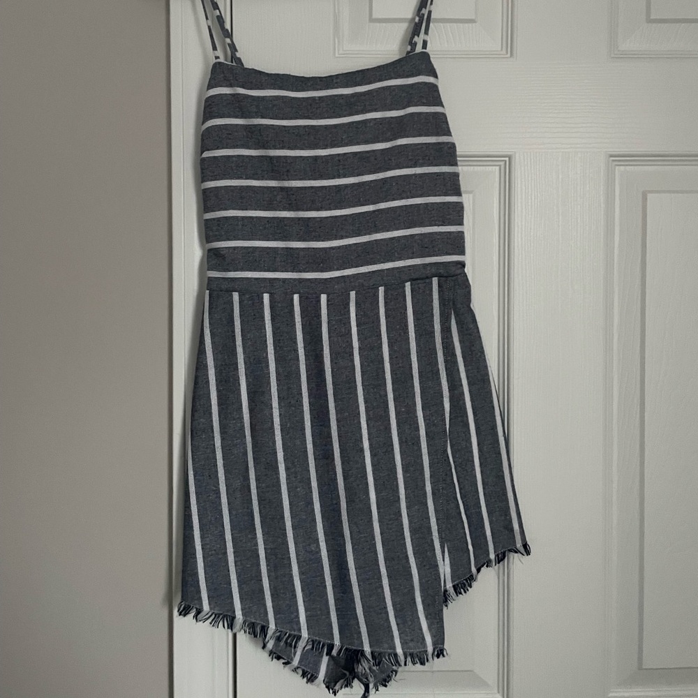 Vestique blue and white striped romper with open back. Size medium